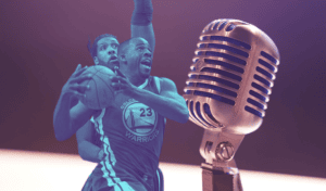 Warriors F/C Draymond Green depicted next to a broadcaster's microphone